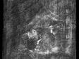 X-radiograph of Old Woman at a Niche by Candlelight showing the original flame of the oil lamp at the center right