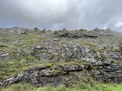 The rocky slope of Leffe Valley, site of the original Chérau de Charlemagne