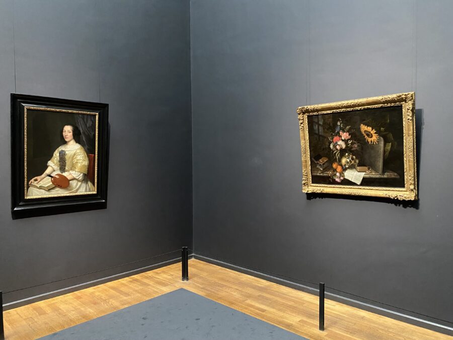 Installation photograph of Maria van Oosterwijck’s Vanitas Still Life with Wallerant Vaillant’s portrait of her in the Rijksmuseum’s Gallery of Honor, 2025