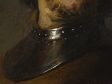 Rembrandt, The Laughing Man (fig. 9), detail showing the gold leaf layer shimmering through the thin paint in the background and gorget (Image: Petria Noble)
